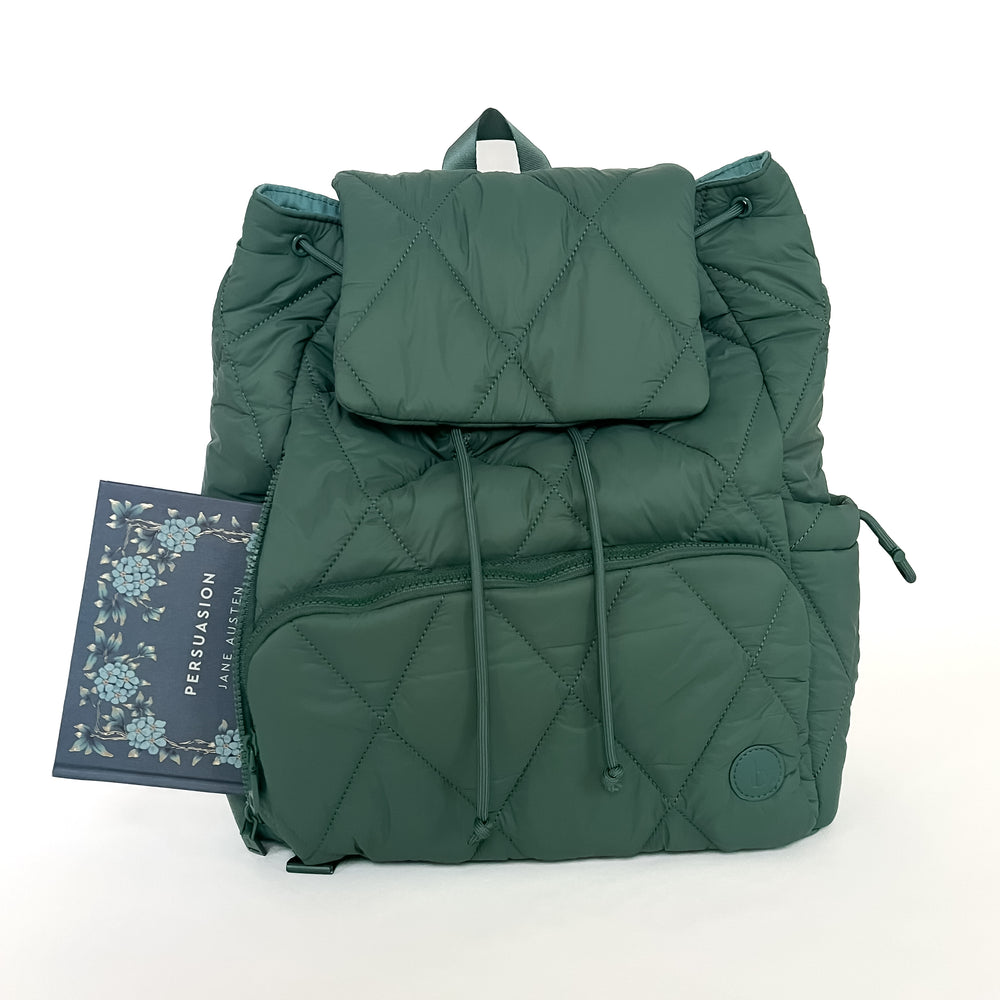 The Bookish Backpack in green on a blank backgorund